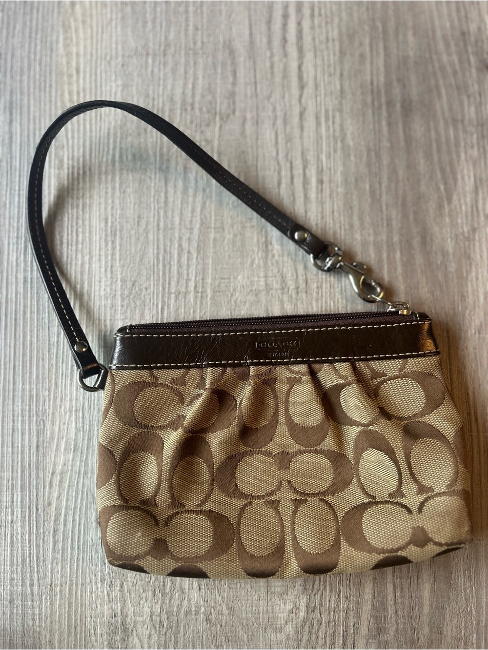 0123. Vintage Coach Signature Canvas Wristlet